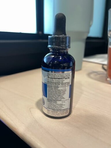 Complex Diet Drops bottle with a label showing the ingredients.