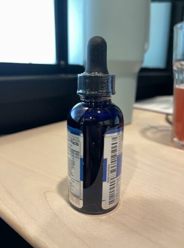 Complex Diet Drops bottle with a label showing the ingredients and a step-by-step guide.