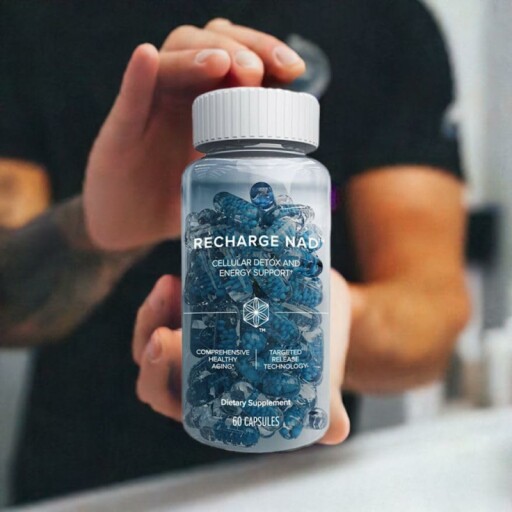 Isagenix Recharge NAD bottles with capsules and a cup of water